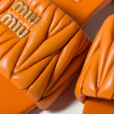 Miu Miu Matelasse Nappa Leather Slides Gerbera Daisy Miu Miu Matelasse Nappa Leather Slides Gerbera Daisy