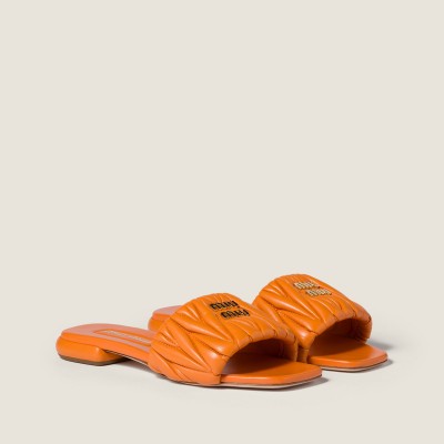 Miu Miu Matelasse Nappa Leather Slides Gerbera Daisy Miu Miu Matelasse Nappa Leather Slides Gerbera Daisy