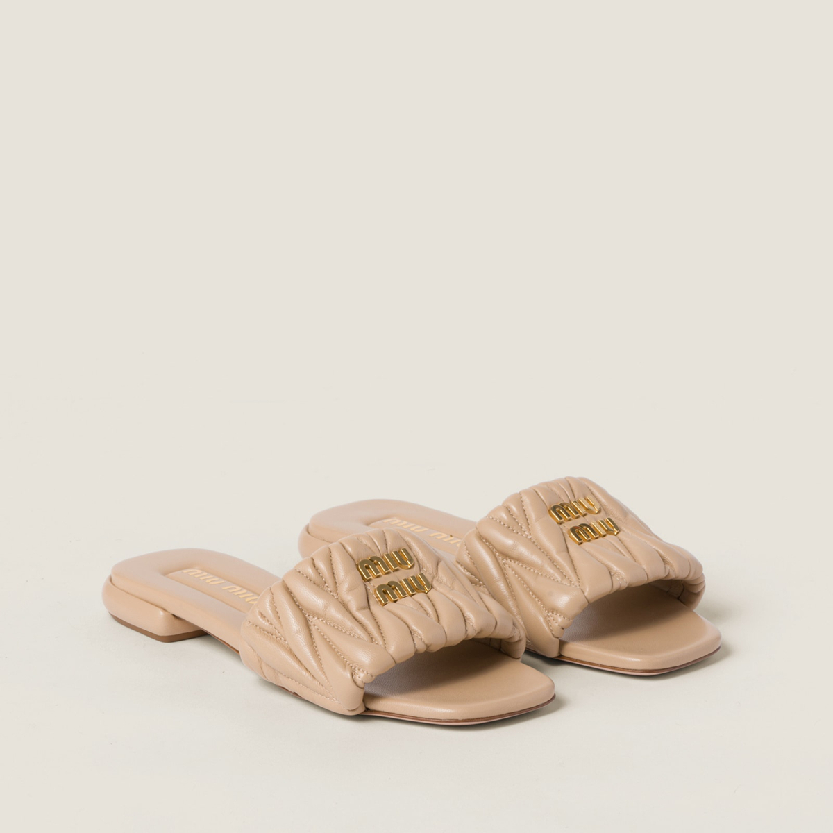 Miu Miu Matelasse Nappa Leather Slides Sand Beige Miu Miu Matelasse Nappa Leather Slides Sand Beige